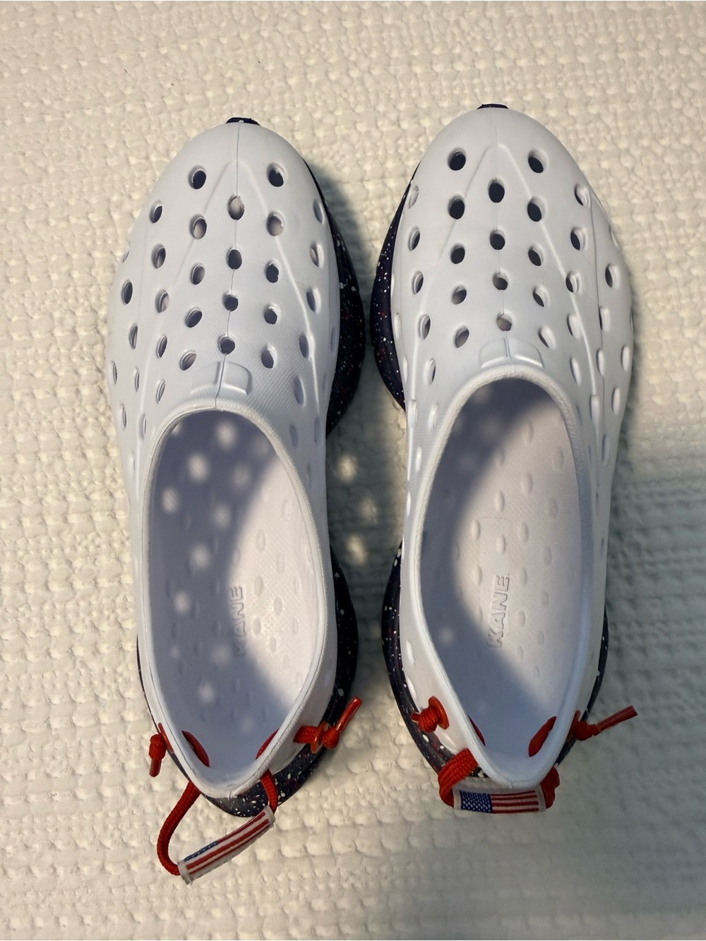 Kids Kanes White Water Slip-On Shoes with Navy Speckle Sole and Red Accents